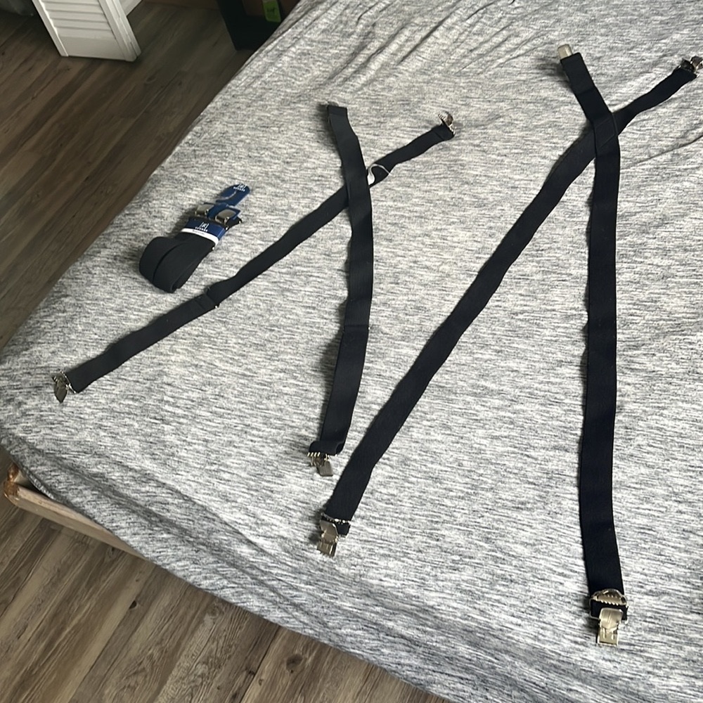 Black Suspenders. 2 opened and used only once. 3rd is brand new in packaging